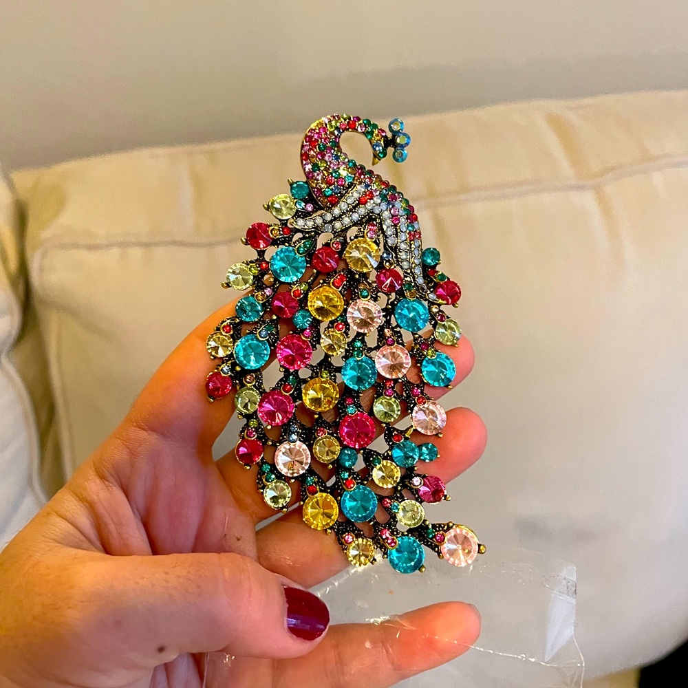 Peacock broche with multi colored stones